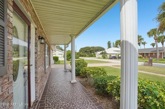 a view of entrance gate of the house