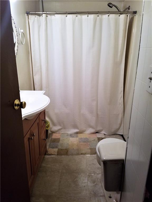 122 Cubbage Lane Butler, PA 16001 - Photo 11 of 25 Main level full bathroom just off the bedroom.