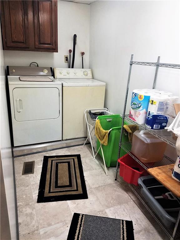 122 Cubbage Lane Butler, PA 16001 - Photo 12 of 25 Main floor laundry room with plenty of room for storage or extra pantry items.
