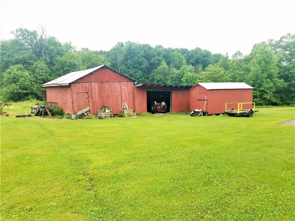 122 Cubbage Lane Butler, PA 16001 - Photo 25 of 25 This is a very large barn with 5 stalls and another shed in the front.