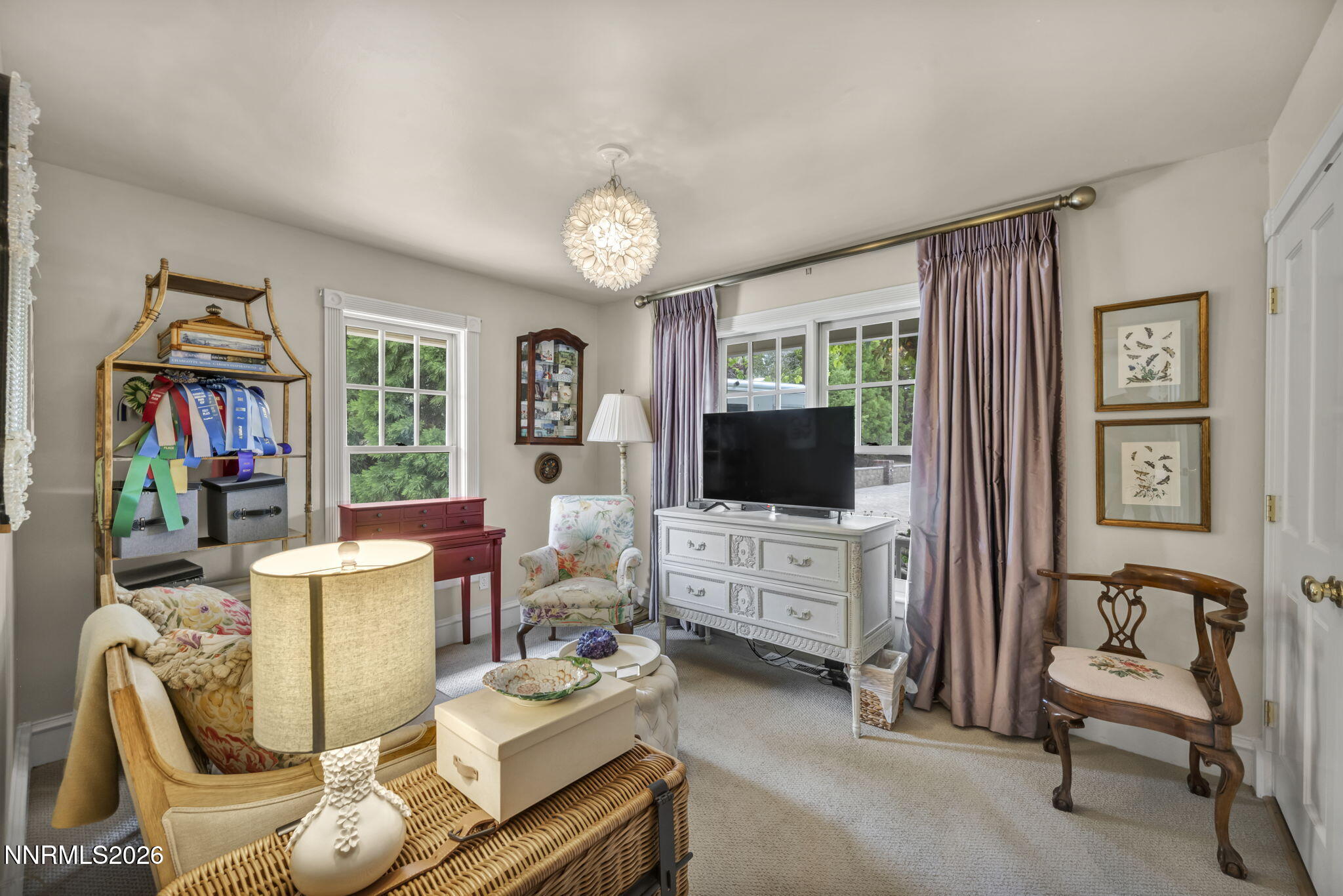 4010 Canyon Drive Reno, NV 89519 - Photo 75 of 147 a living room with furniture a flat screen tv and a large window