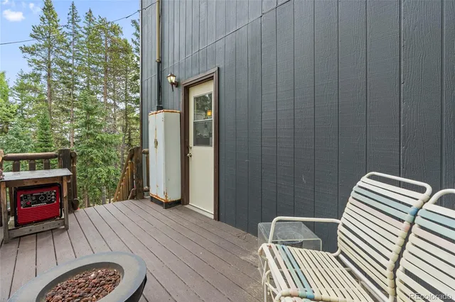 a bedroom with a bed and a fireplace
