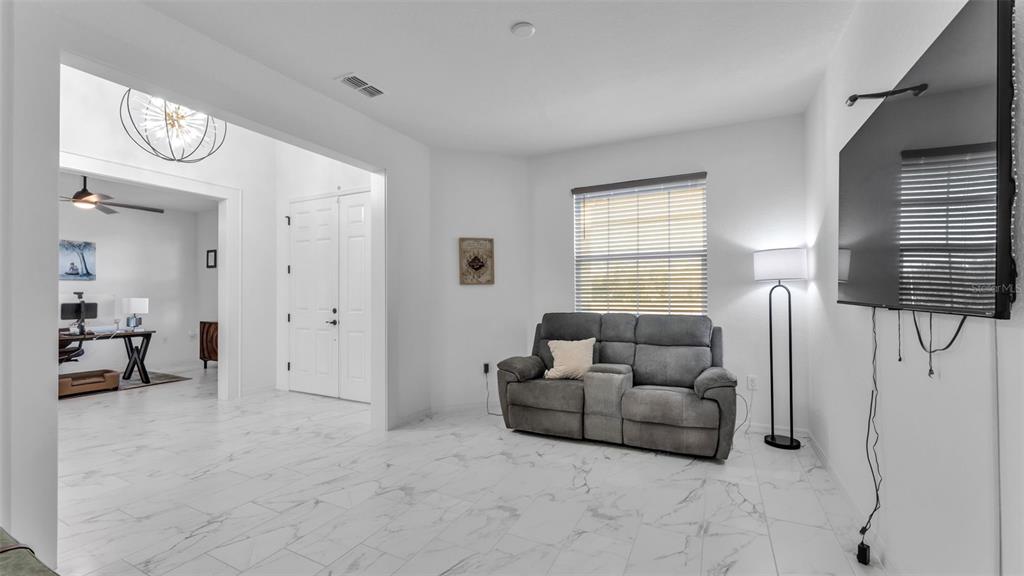 1029 Bergamot Drive Bartow, FL 33830 - Photo 14 of 62 a living room with furniture and a window