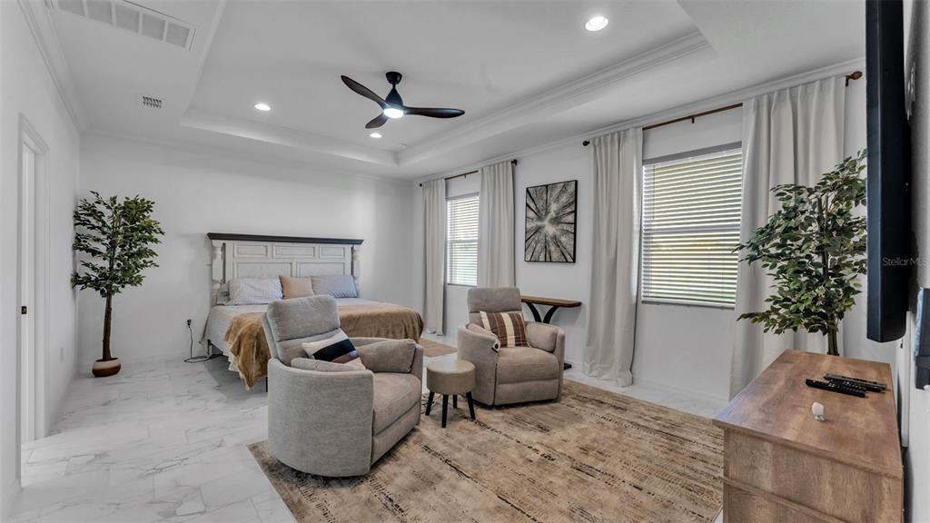 1029 Bergamot Drive Bartow, FL 33830 - Photo 28 of 62 a living room with furniture and a potted plant