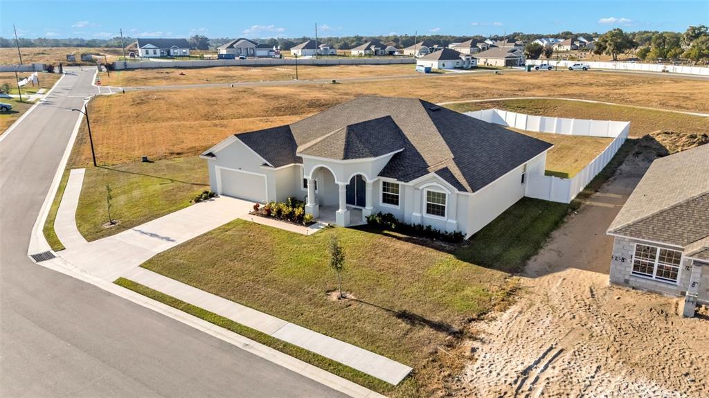 1029 Bergamot Drive Bartow, FL 33830 - Photo 60 of 62 an aerial view of residential houses with outdoor space