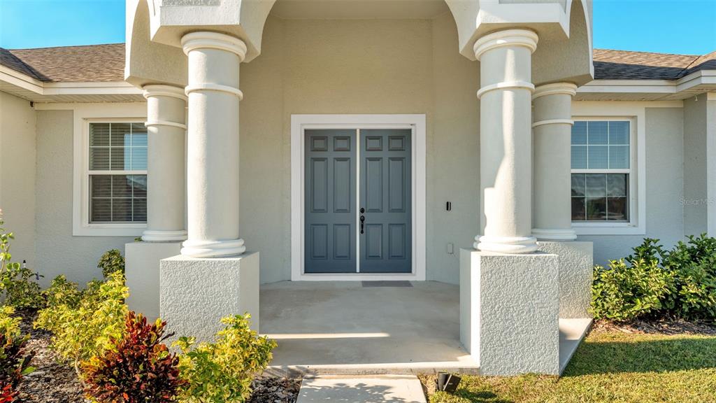 1029 Bergamot Drive Bartow, FL 33830 - Photo 8 of 62 a front view of a house with a garden