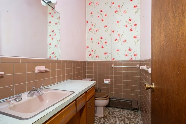 a room with a brick wall