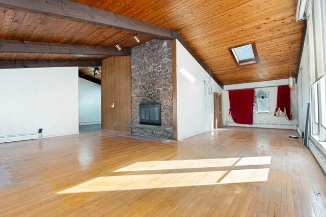 a view of an entryway with a fireplace