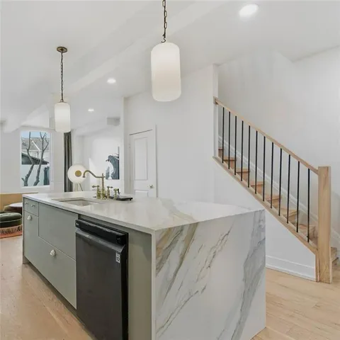 a kitchen with sink and window
