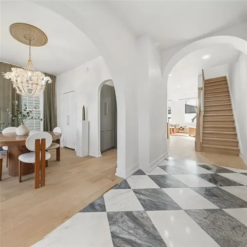 a view of a livingroom with furniture and window