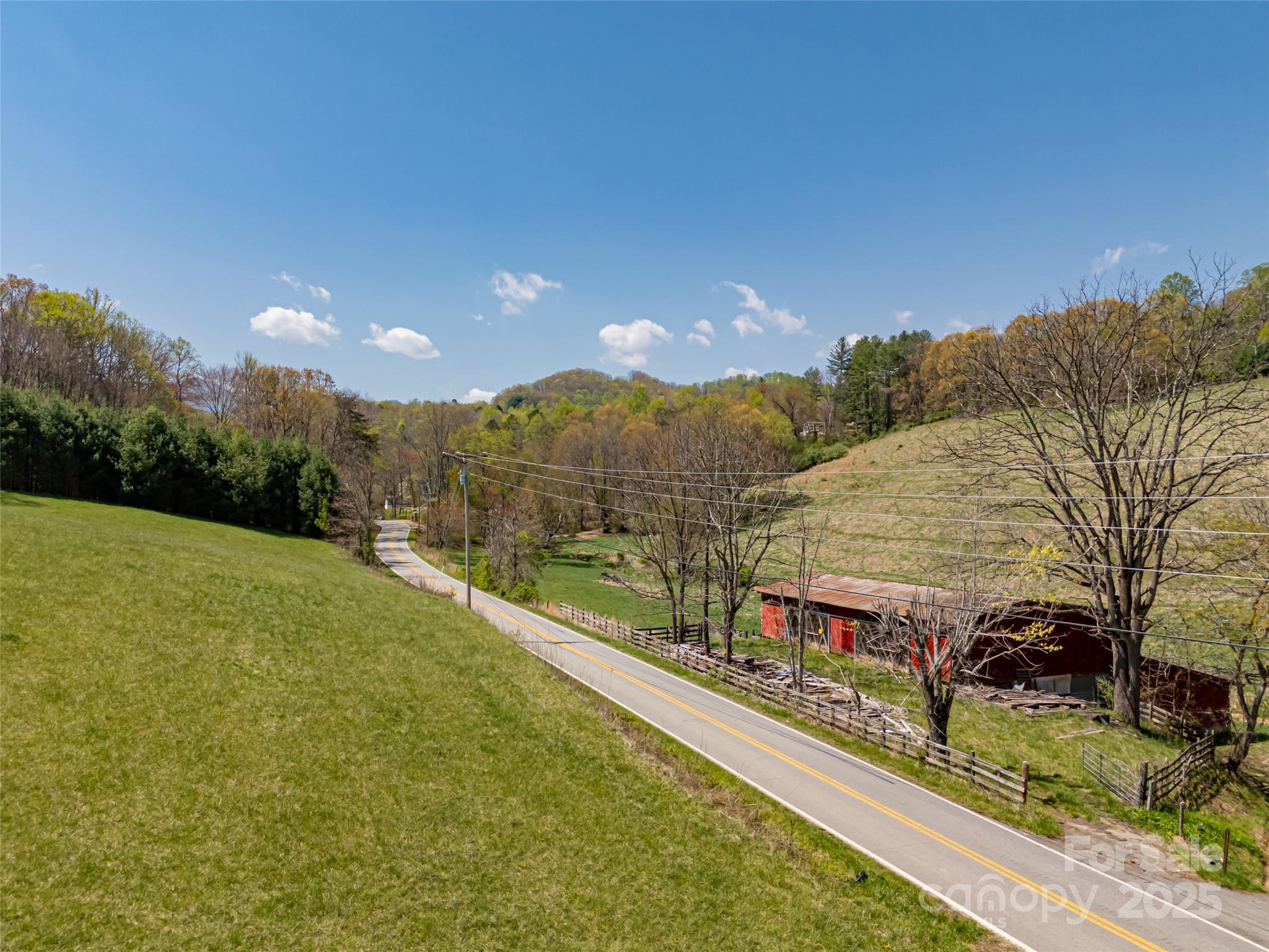 435 Upper Glady Fork Road Candler, NC 28715 - Photo 47 of 47 a view of a city from a balcony