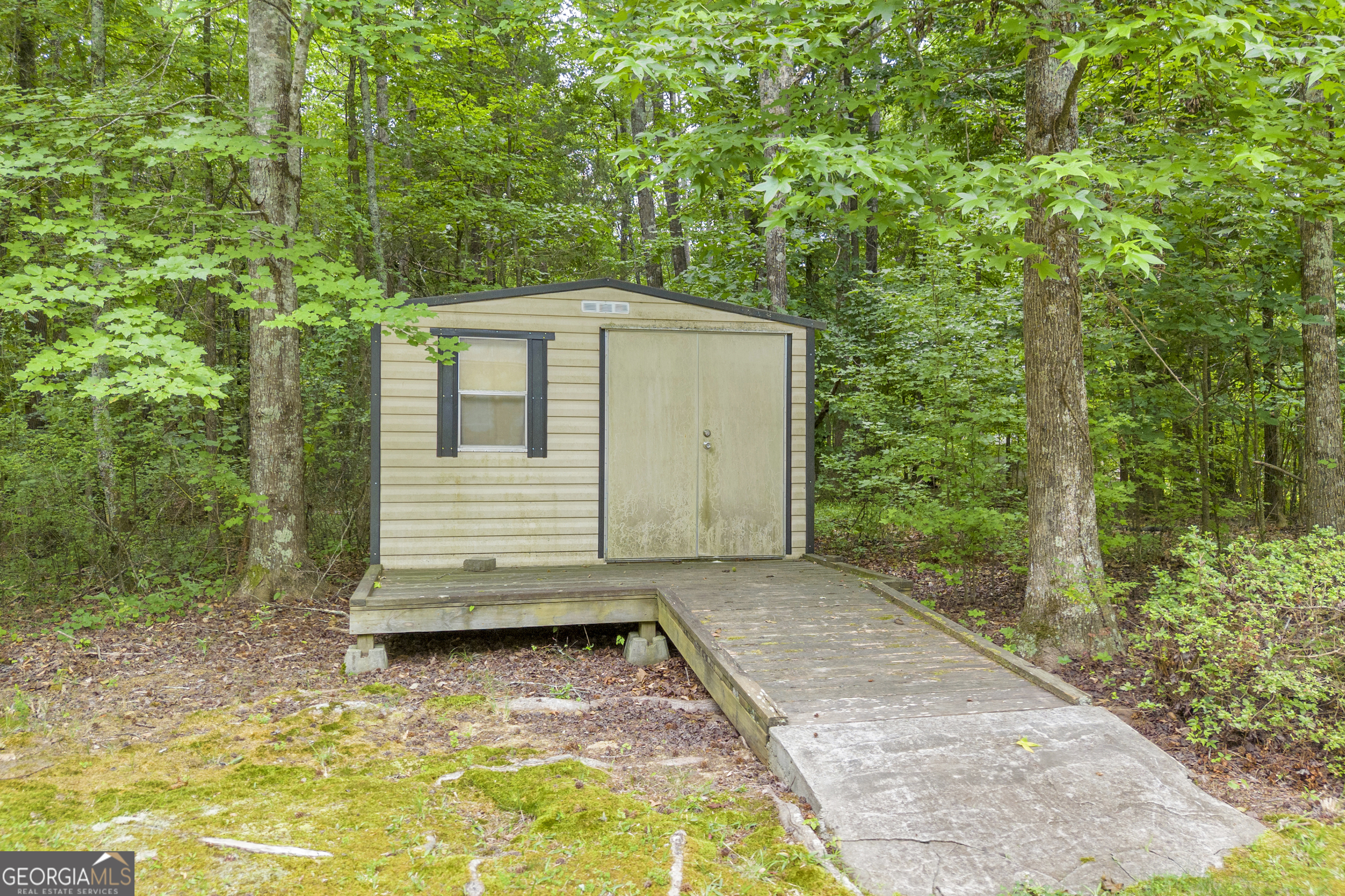 163 Tuxedo Drive Commerce, GA 30530 - Photo 52 of 62 a view of a back yard of the house