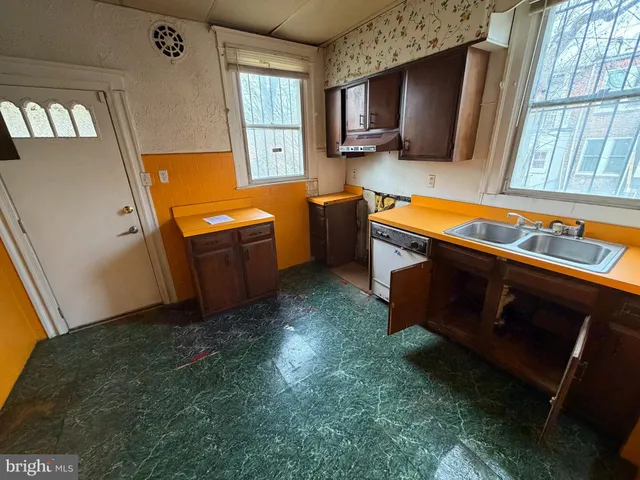 a room with furniture and a flat screen tv