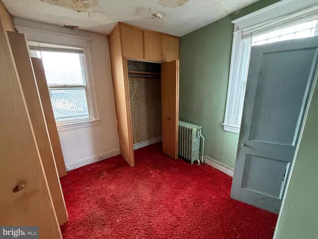 an empty room with windows