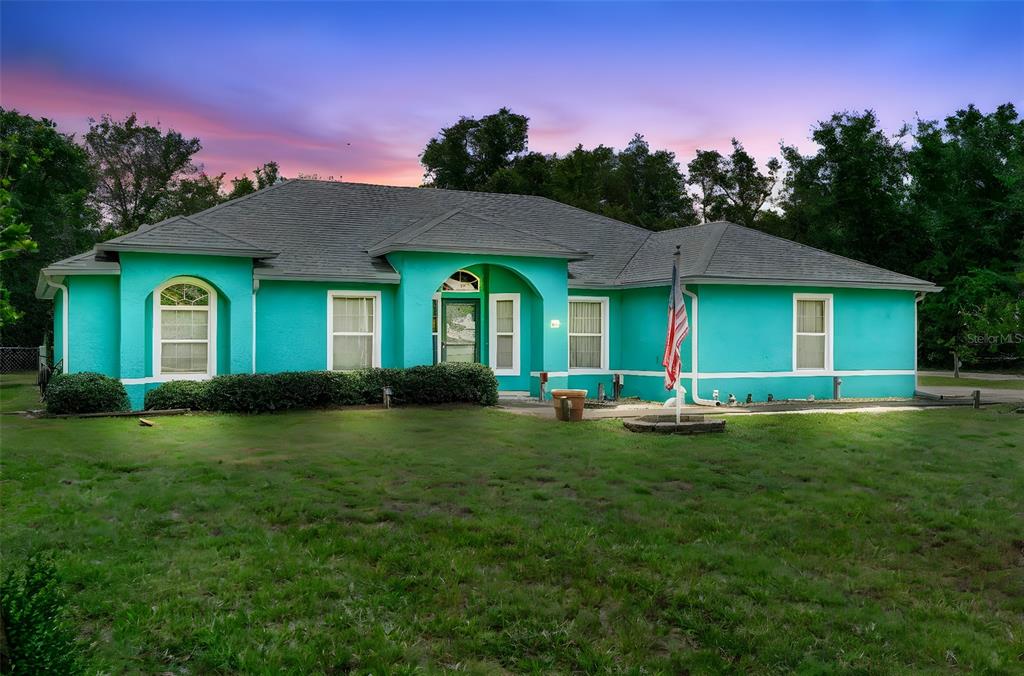 56 Spruce Lane DeBary, FL 32713 - Photo 1 of 1 a view of a house with a yard