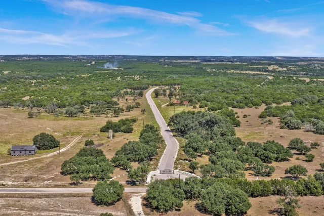 an aerial view of a houses with outdoor space
