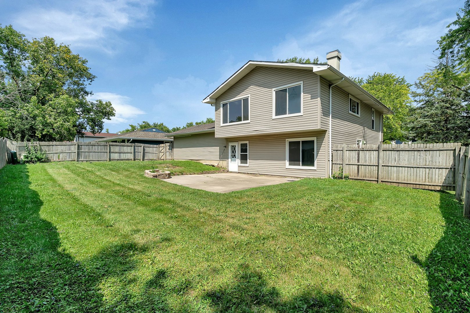 161 South Schmidt Road Bolingbrook, IL 60440 - Photo 25 of 26 a view of a house with a yard