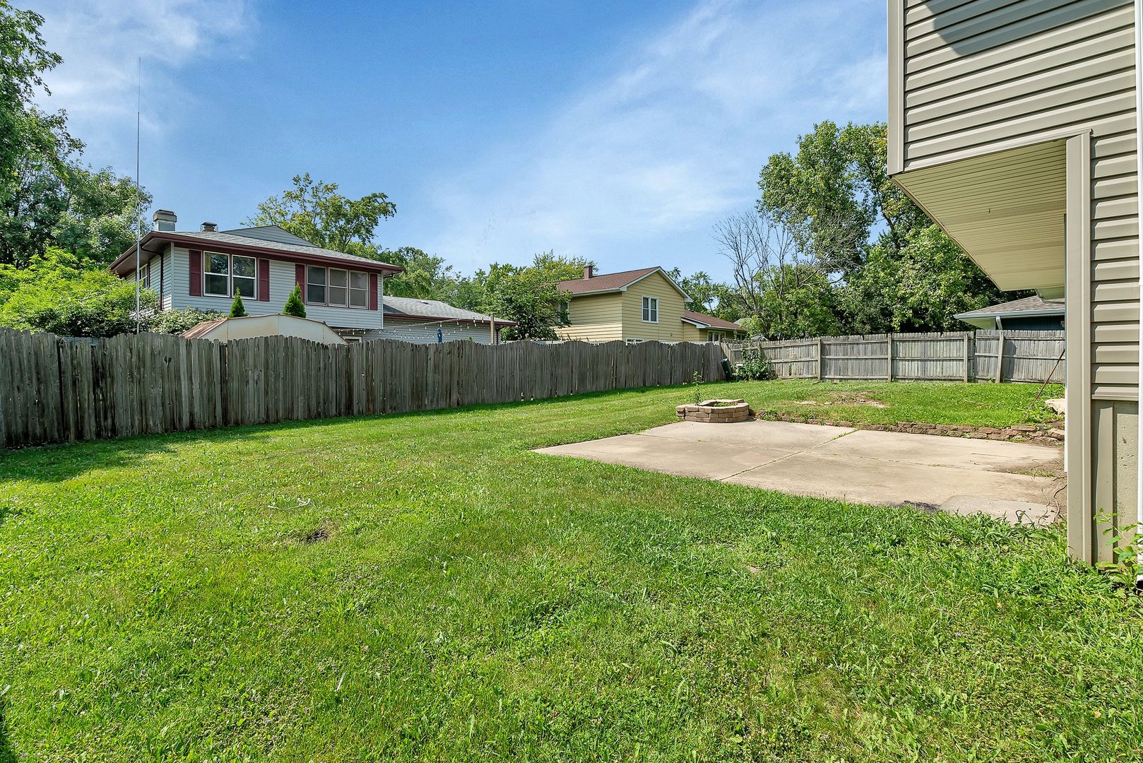 161 South Schmidt Road Bolingbrook, IL 60440 - Photo 26 of 26 a view of a backyard with a garden and entertaining space