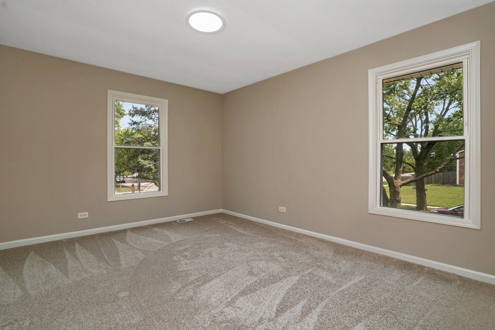 161 South Schmidt Road Bolingbrook, IL 60440 - Photo 7 of 26 an empty room with windows
