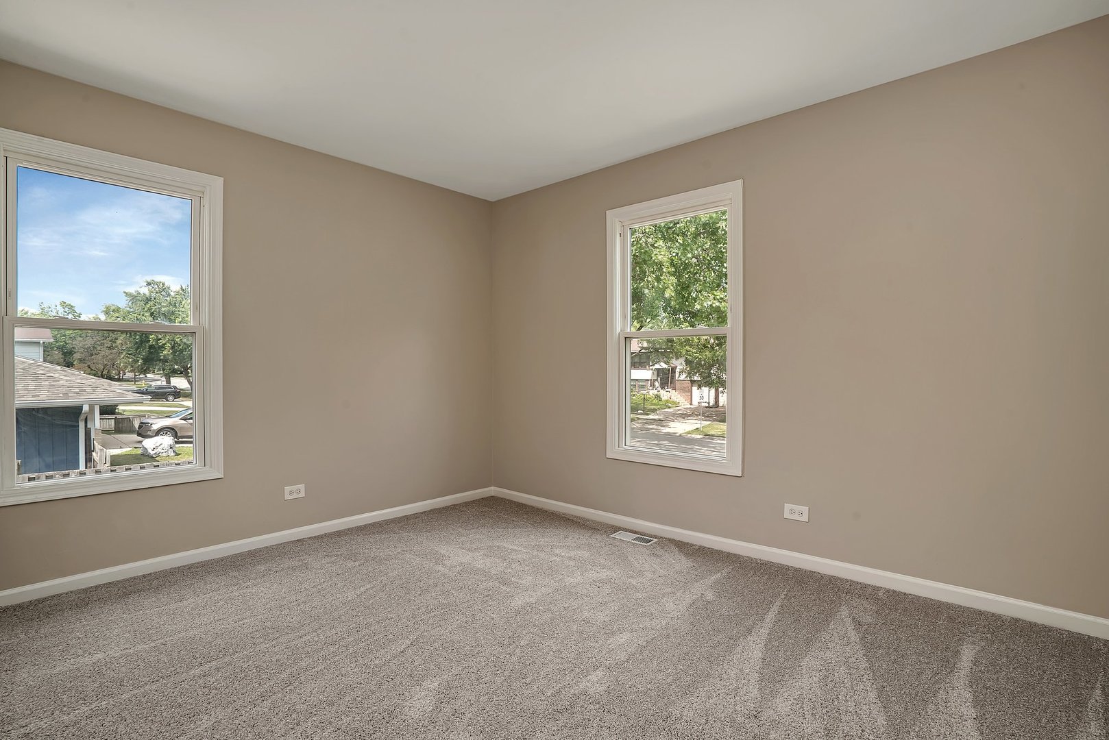161 South Schmidt Road Bolingbrook, IL 60440 - Photo 8 of 26 a view of an empty room with a window
