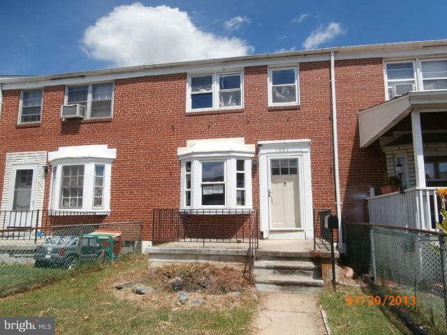 1026 Arncliffe Road Essex, MD 21221 - Photo 1 of 17 a front view of a house with a yard