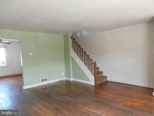 1026 Arncliffe Road Essex, MD 21221 - Photo 2 of 17 a view of entryway with wooden floor
