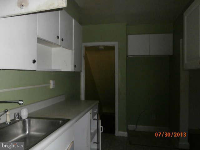 1026 Arncliffe Road Essex, MD 21221 - Photo 5 of 17 a view of a sink under an umbrella