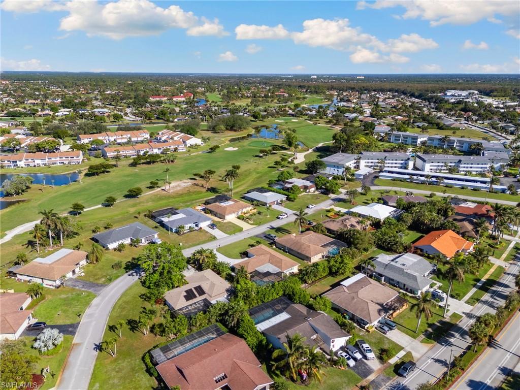 230 Pine Valley Circle Naples, FL 34113 - Photo 36 of 40 an aerial view of residential houses with outdoor space