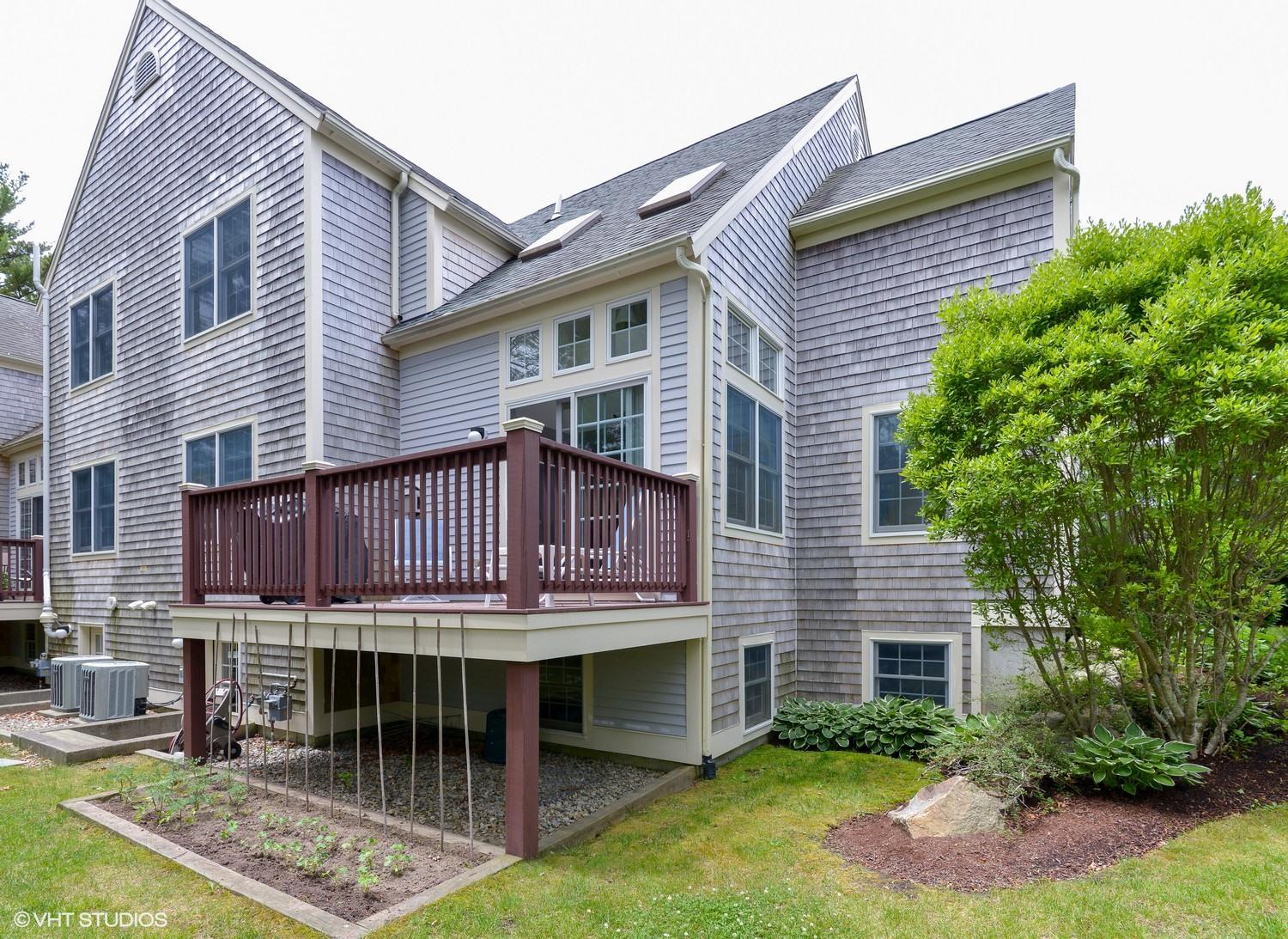 23 Gold Leaf Lane Mashpee, MA 02649 - Photo 15 of 15 a view of a chairs and table in the patio