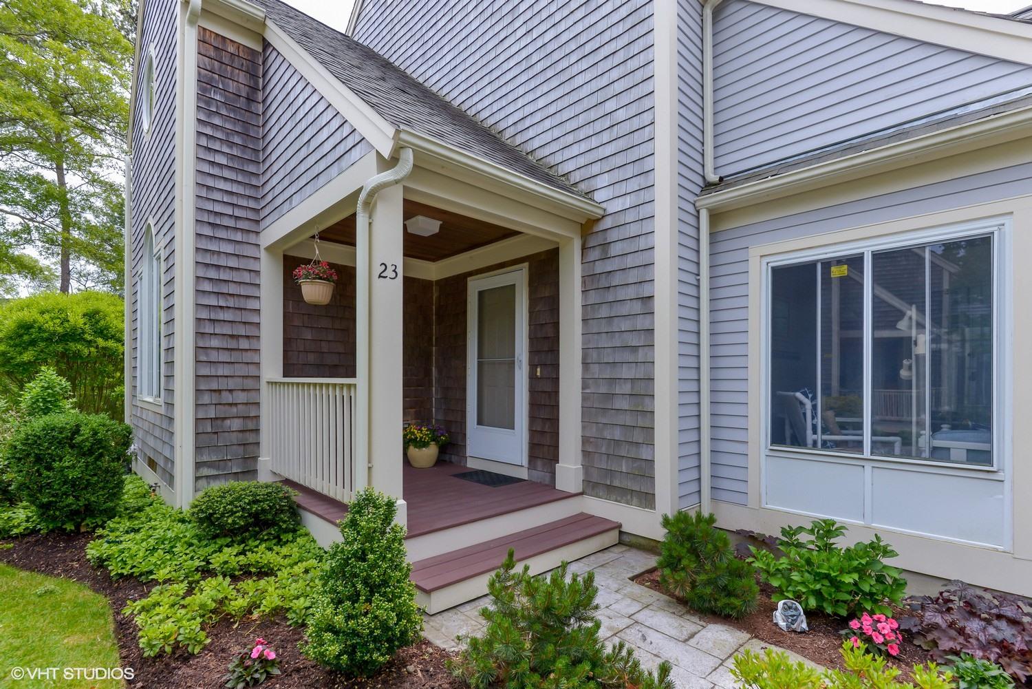 23 Gold Leaf Lane Mashpee, MA 02649 - Photo 2 of 15 a view of a house with potted plants