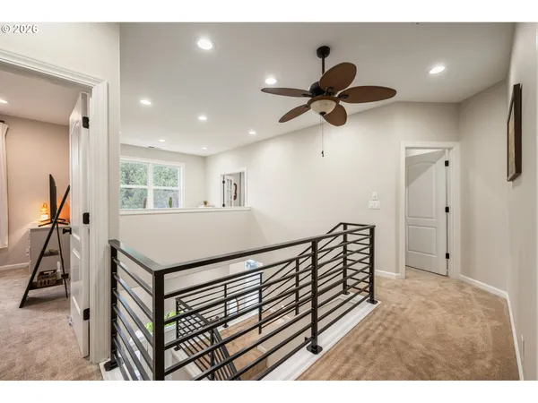 a view of a hallway with workspace