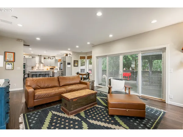 a living room with furniture and a table