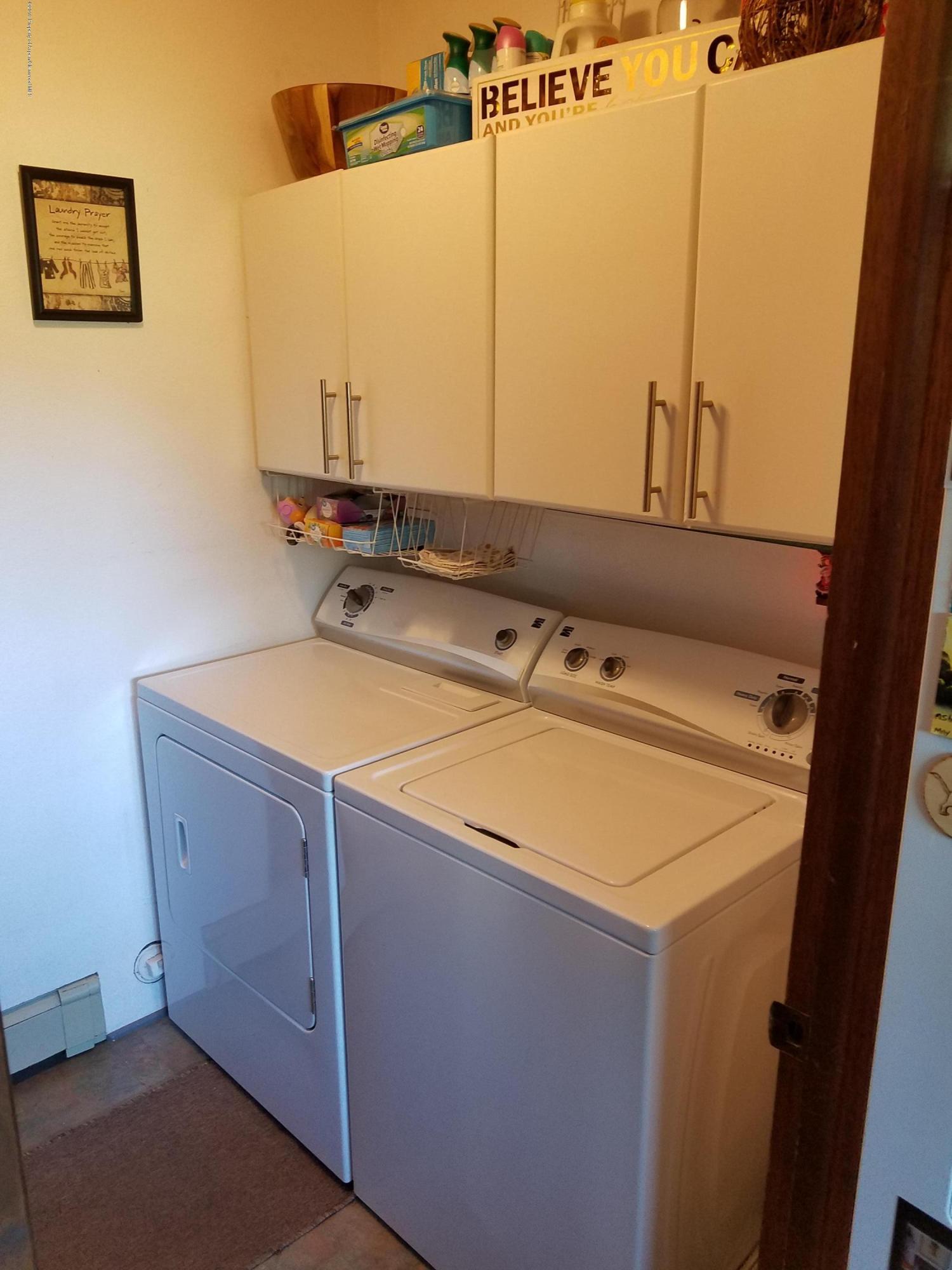 515 East 11th Street Rifle, CO 81650 - Photo 22 of 23 a bathroom with a sink and a mirror