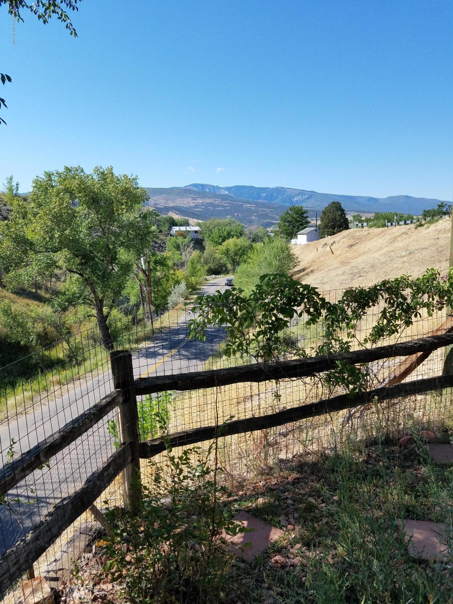 515 East 11th Street Rifle, CO 81650 - Photo 5 of 23 a view of a lake from a balcony