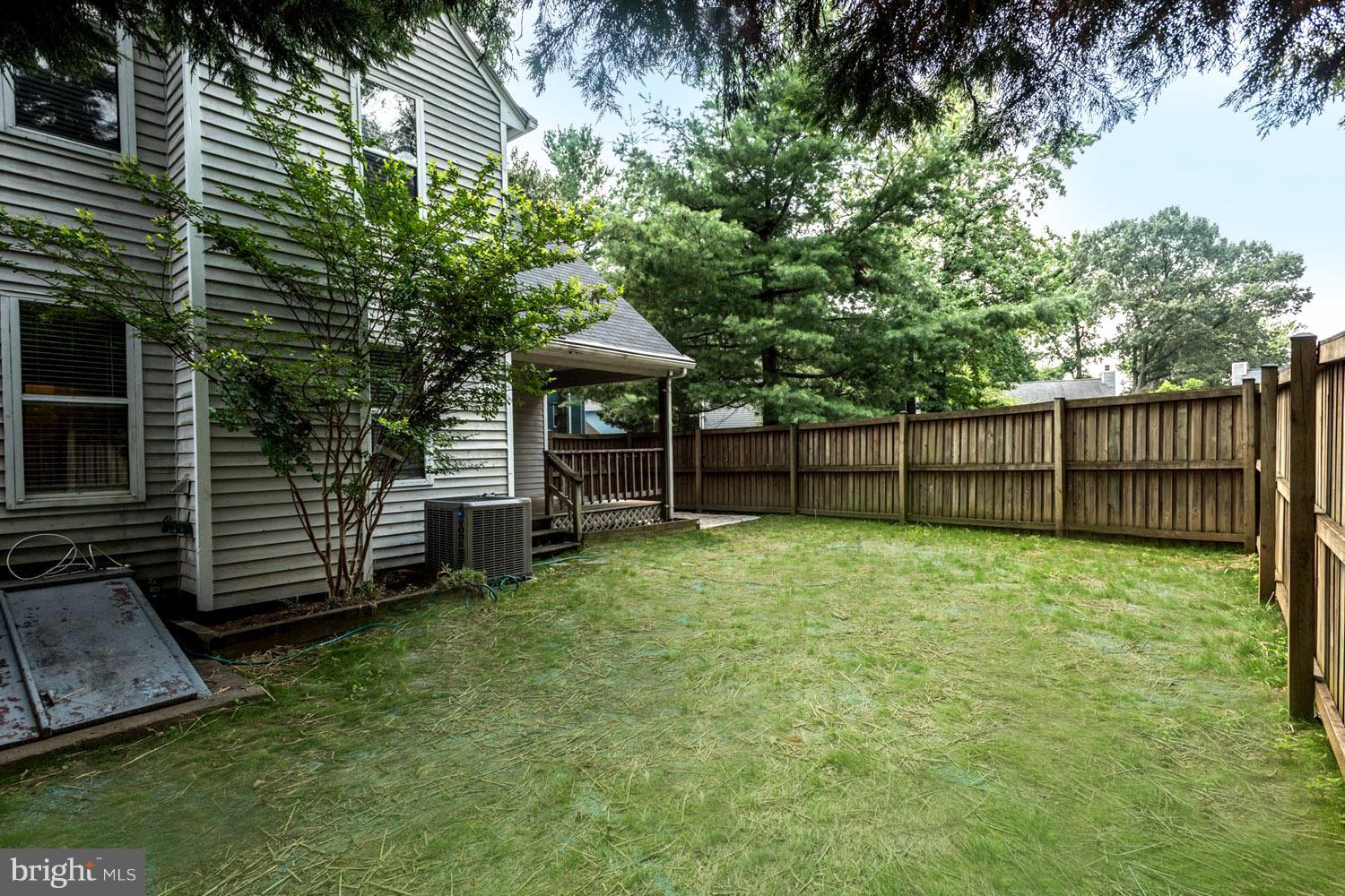 1548 Ritchie Lane Annapolis, MD 21401 - Photo 9 of 30 Tree-Shaded Privacy Fenced Yard for Pets and Play