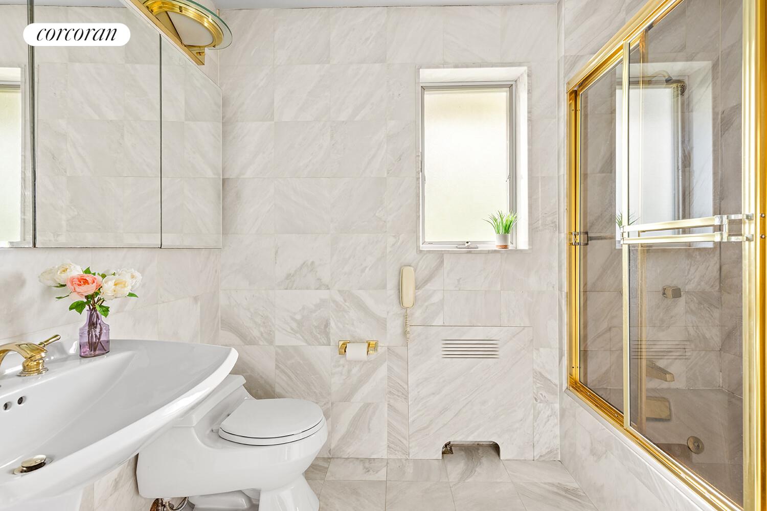 2401 Avenue R Brooklyn, NY 11229 - Photo 12 of 14 a bathroom with a sink toilet and shower