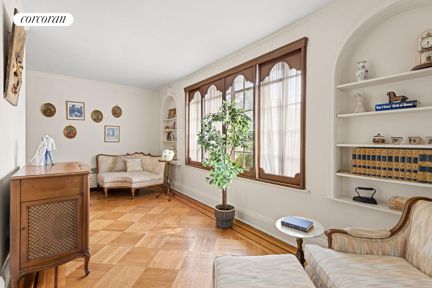 2401 Avenue R Brooklyn, NY 11229 - Photo 4 of 14 a living room with furniture and a large window