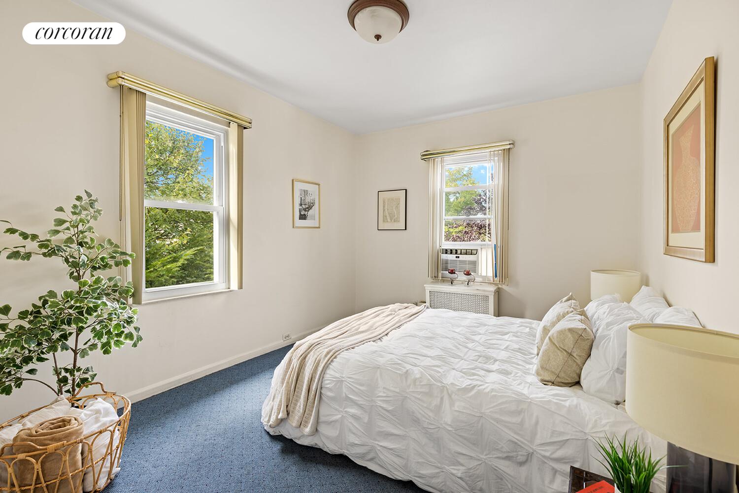 2401 Avenue R Brooklyn, NY 11229 - Photo 9 of 14 a bedroom with a bed and a window