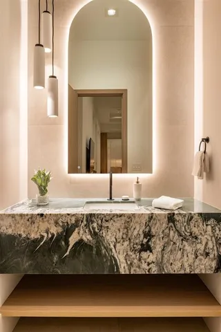 a view of living room filled with furniture and window