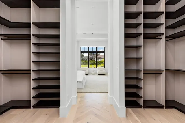 a room with gym equipment and a large window