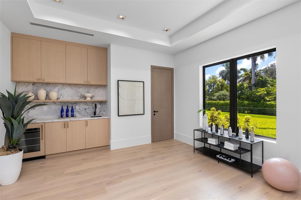 12701 Luray Road Southwest Ranches, FL 33330 - Photo 23 of 50 a room with furniture and a window