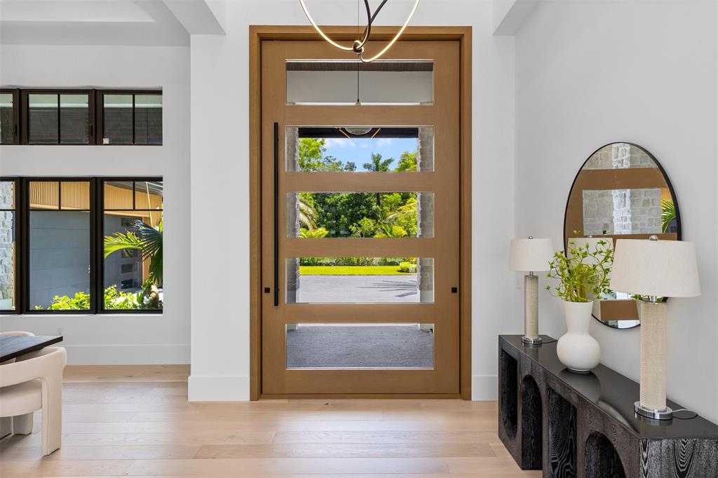 12701 Luray Road Southwest Ranches, FL 33330 - Photo 25 of 50 a front view of a house with garden