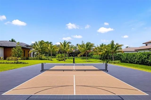 an aerial view of a house with a swimming pool