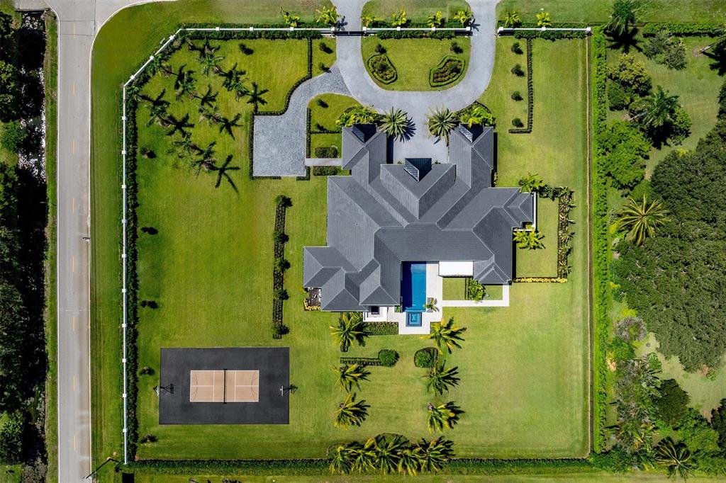 12701 Luray Road Southwest Ranches, FL 33330 - Photo 45 of 50 an aerial view of a house with a swimming pool