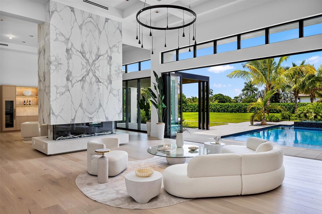 12701 Luray Road Southwest Ranches, FL 33330 - Photo 5 of 50 a living room with fireplace furniture and a large window
