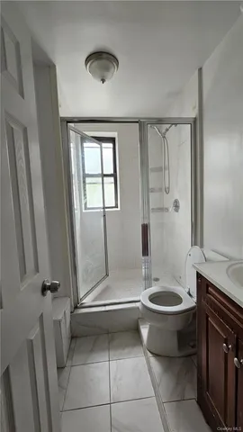 a bathroom with a sink a toilet and tub