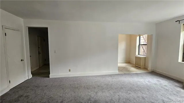 a view of an empty room with window