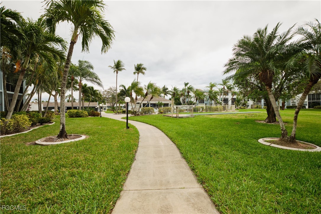 5959 Winkler Road, Unit 118 Fort Myers, FL 33919 - Photo 3 of 22 a view of a park with palm trees