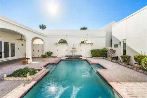 a view of a patio with potted plants