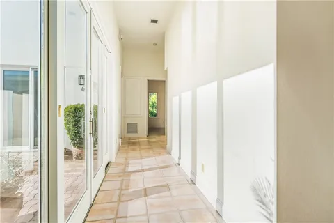 a view of a bathroom from the hallway